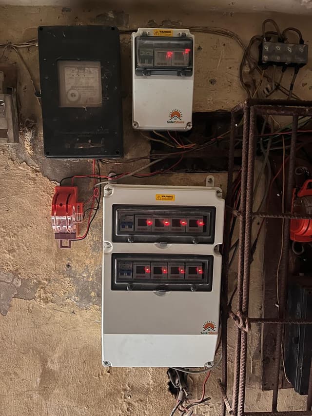 SolarShare smart prepaid meter installed on a wall